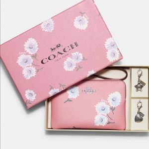 Coach wristlet with Daisy print